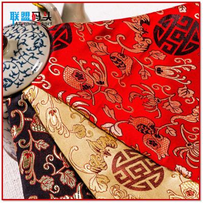 China Wholesale Cheap In-stock Polyester Satin Woven Jacquard Fabric Brocade Fabric Viable For Decorative Cheongsam Dressing Curtain for sale