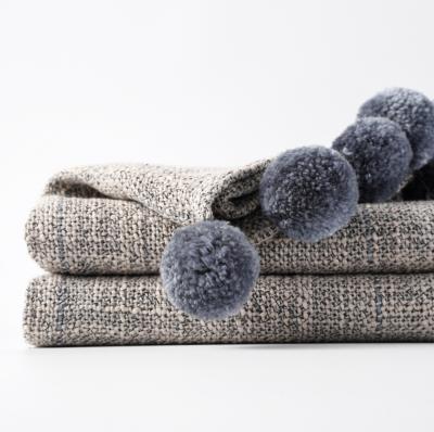 China Simple Gray Summer Knit Woven Pompom Blanket for Sofa Home Decoration for sale