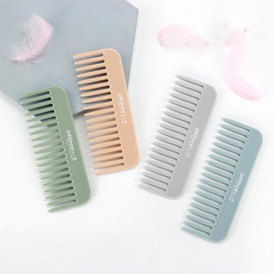 China Portable Wholesale Custom Cartoon Salon Static Plastic Hair Brush Wide Tooth Comb for sale