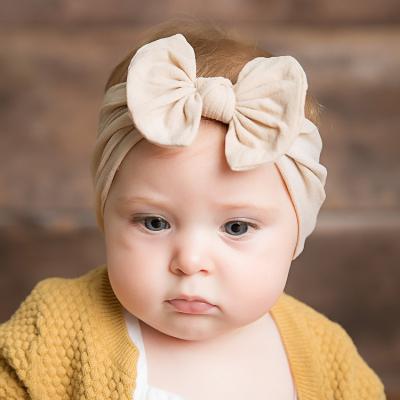 China Eco-Friendly Hot Sale Newborn Girl Hair Band Solid Pure Colors Ins Ribbon Bows Baby Nylon Headband for sale