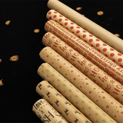 China Word And Pattern Printing Holiday Home Christmas Gift Wrapping Recyclable Heating Paper for sale