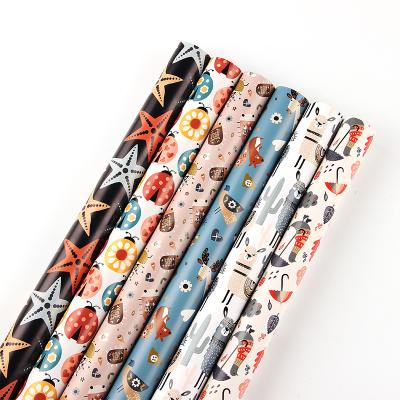 China Custom Printed Coated Paper Recyclable Birthday Gift Wrap Wrapping Paper Gift Supplier for sale