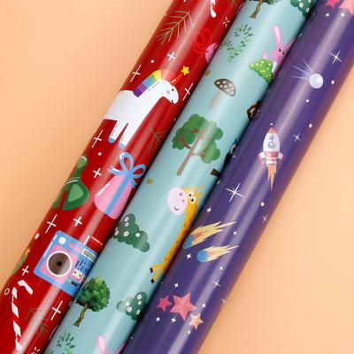 China Custom Color Printed Recyclable Christmas Birthday Gift Wrapping Paper Cartoon Wrapping Paper Wholesale for sale