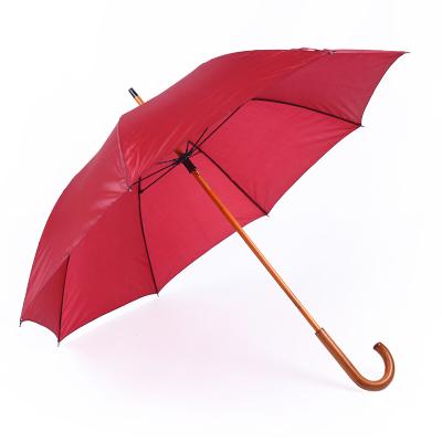 China Custom High Quality Contracted Umbrella Classic Solid Color Red Straight Umbrella for sale