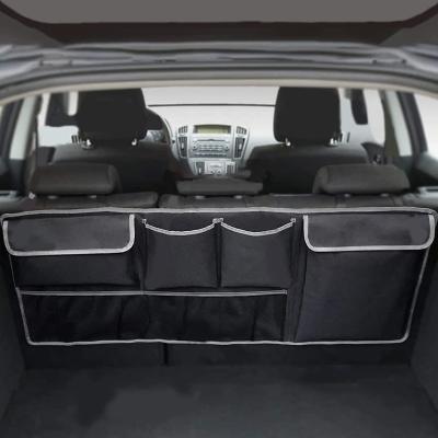 China Car Hanging Organizer Car Hanging Bag Car Trunk Back Seat Storage Bag Car Trunk Organizer with 4 Pockets 2 Mesh Pouches for sale