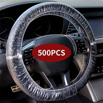 China Universal Car Steering Wheel Protector 500PCS/bag Plastic Transparent Car Disposable Steering Wheel Covers With Elastic Trims for sale