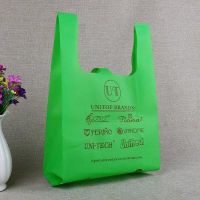 China 100% Cheap Price 30*50+14cm Promotional Nonwoven China Vest Bag Green T-shirt Bag Eco-friendly Nonwoven Vests Wear for sale