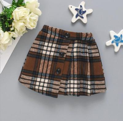 China 2020 Breathable Kid Girls Short Pleated Cotton Blend Skirt High Waisted Winter Plaid Children Wholesale Skirt for sale