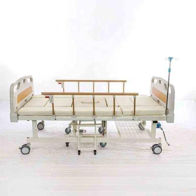 China Multi Function 5 Function Manual Adjustable Elderly Home Nursing Hospital Medical Wheelchair Bed With Toilet for sale