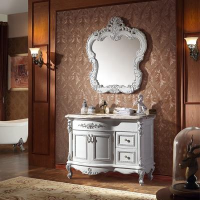 China CLASSIC luxury wood handcrafted single sink bathroom cabinet with silver leaf details WTS1617 for sale