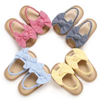 China Soft Unique Newborn Baby Sandals and Slippers Bebe Non-Slip Flat Cute Girl Infant Summer Breathable Canvas Knot Bow for sale