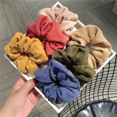 China Fashion Women Solid Soft Polyester Elastic Hair Bands Scrunchie Hair Bands Scrunchies For Women Designer for sale