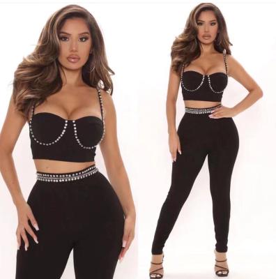 China 2022 Anti-Static Hot Selling Two Piece Bandage Set Halter Tops And High Waist Beaded Pants Female for sale