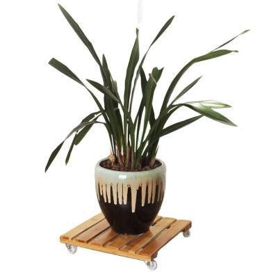 China Factory Direct Sales Modern Adjust Flower Stand Tray With Wheels Small Customized Mobile Bamboo Flower Tray for sale