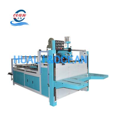 China Semi Automatic Food Ocean Carton Box Edge Folding Gluing Machine For Corrugated for sale