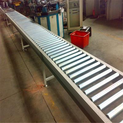 China Heat Resistant Fluctuating Expandable Plastic Conveyor Belt Prices Roller Gravity Conveyors Telescopic Belt Conveyor for sale