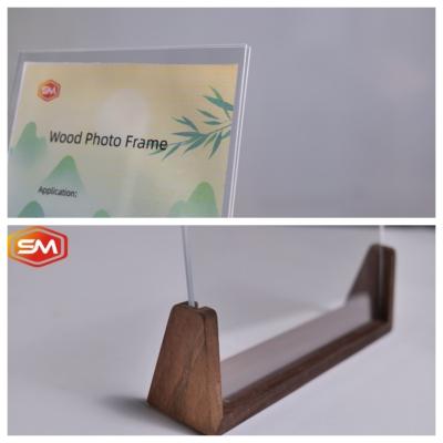 China Cuadro de pantalla de acrílico transparente con base de madera personalizada en venta