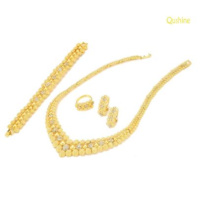 China Qushine Romantic Hot Selling Arabic Diamond Set Women Necklace Ring Bracelet Gold Plated Four-pieces Earrings Set Jewelry for sale