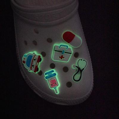 China Clog Charm Stock PVC Rubber Led Flashing Shoe Charms Accessories Loops Luminous Light Up Medical Shoe Charm for sale