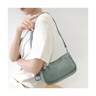 China Fashion low price ladies travel mini solid color handbag mobile phone shoulder bag for sale