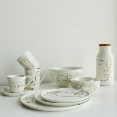 China Viable good quality unique nordic style face gold minimal print custom design porcelain dinnerware set ceramic dinnerware set for sale