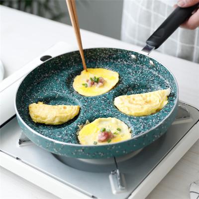 China 2022 Traditional Hot Sale 24cm Amazon Four Hole Non Stick Pan Saucepan Steak Egg Frying Pan Medicalstone Flat Bottomed Non Stick Pan for sale