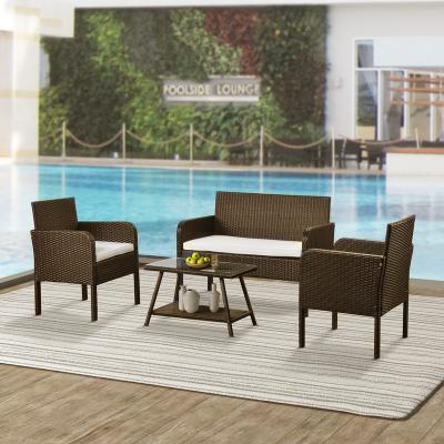 China Weatherproof Brown Outdoor Rattan Sofa Sofa White Cushion Fabric Garden Sofas Set Of Four for sale