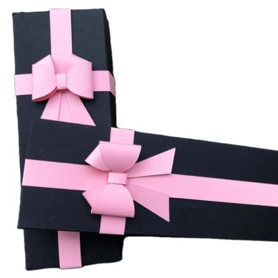 China Recyclable Custom Gift Box Pink Ribbon Casket Form Black Gift Packaging Box For Squid Game With Name Card for sale