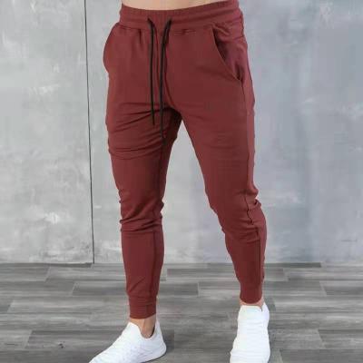 China Anti-wrinkle men's pants slim pants wholesale men's pants jogger printed pant for men for sale