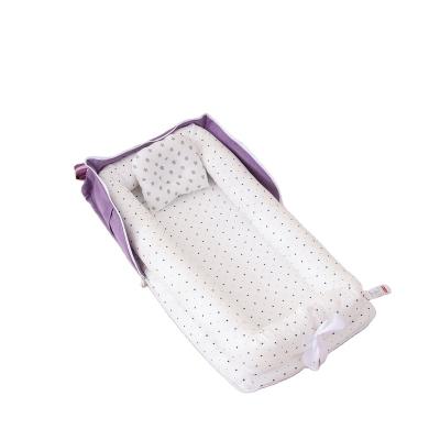 China Factory direct sales hot organic baby nest newborn useful baby nest wrap crib bumper for sale