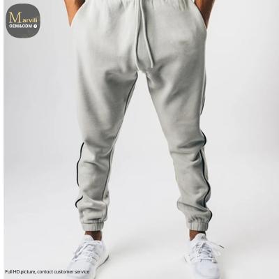 China Anti-Wrinkle Slim Fitness Men's Gym Sports Wear Joggers Sport Joggers Drawstring Solid Color Pants Mens Bottoms And Pants For Men for sale