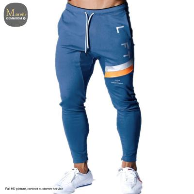 China Anti-Wrinkle Casual Slim Fit Muscle Fitness Pants Hip Pop Sport Drawstring Zipper Track Pants Sporty Skinny Pants for sale