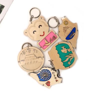 China Wood custom plywood bamboo nut laser engraving Europe LOGO key chain for business gifts for sale