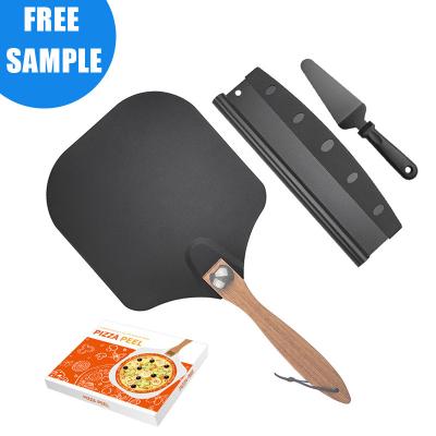 China Custom Rotating Foldable Wooden Handle Stocked Non-Stick Coating Square Black Logo Pizza Peel With Cutter And Serving Set Baking Tool for sale