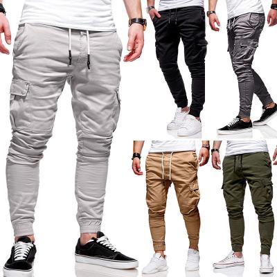 China Anti-Static Men Sports Running Pants Pockets Jogging Legging Gym Pants Sports Training Pants Elasticity Sports Training Pants for sale