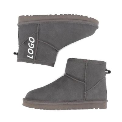 China 2022 fashion trend famous brand women's snow boots high quality leather women's fur trim boots winter upper boots for women warm shoes for sale