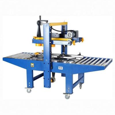 China FJ6050 Automatic CLOTHING Carton Machine Bottom Driven Sealing Tape Sealer, Animated Up-down Tape Carton Sealer, Box Sealer for sale