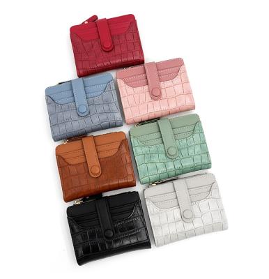 China Minimalist PU Wallet Ladies Short Card Bags And Waterproof Customized Leather Coin Purses for sale