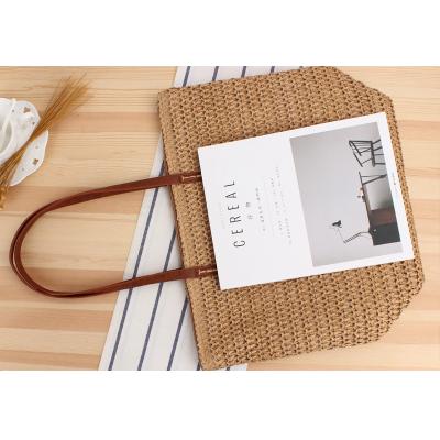 China Holiday Daily Women's Single Shoulder Bohemian Simple Grass One Shoulder Solid Color Leisure Straw Handbag for sale