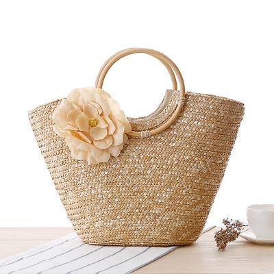 China Fashion Women's Decal Rattan Straw Woven Beach Handle Crochet Handmade Bag for sale