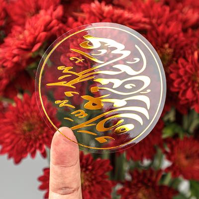 China Waterproof Custom Foil Label Sticker Vinyl Waterproof Hot Stamping Gold Transparent Logo Sticker for sale