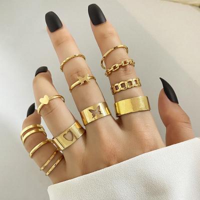 China Common KISSWIFE RTS 12pcs/set Heart Punk Butterfly Thick Rings Shape Women Adjustable Alloy Chain Gold Open Knuckle Ring Set for sale