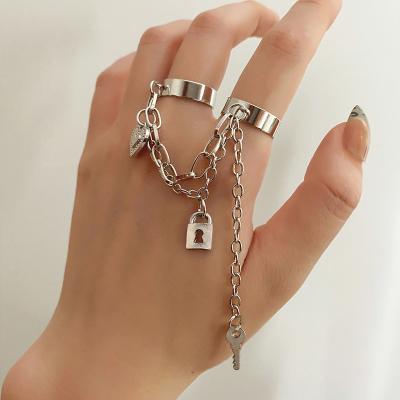 China KISSWIFE Punk Sliver Alloy United Adjustable Ring Barrel Lock Key Heart Tassel Chain Two Finger Double Rings For Women for sale