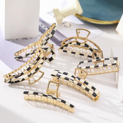 China KISSWIFE Fashion Retro Alloy Women Hair Clips Korean Controller Big Shark Gold Metal Hair Claw For Thick Hair for sale