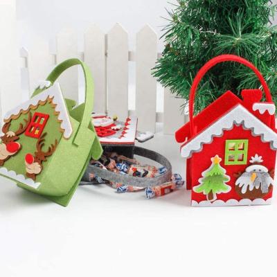 China Party Accessories Christmas Felt Gift Bags Held Candy Bag With Handles Christmas Candy Gift Bags For Christmas Holiday Party Favors for sale