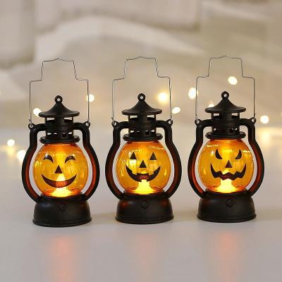 China 2022 New Design Hallowmas Party Halloween Small Lantern Hand Held Pumpkin Lamp For Bar Party Atmosphere Decoration for sale