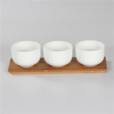 China Restaurant Disposable Modern White Snack Tableware Ceramic Bowl With Bamboo Base for sale