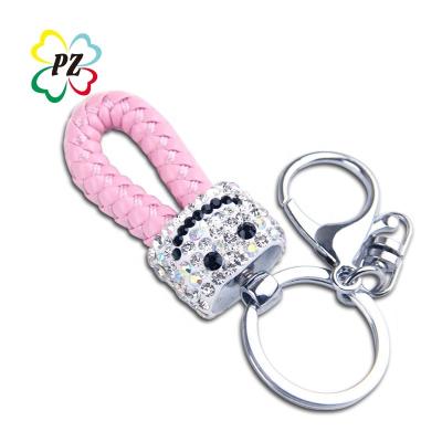 China Metal Face Rope Braided Metal Smile Key Chain Custom Design for sale