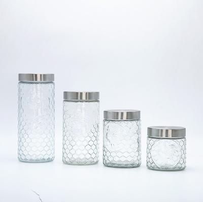 China Viable 4 Piece Vintage Glass Storage Jars With Silver Metal Screw Lid Glass Food Storage Canisters for sale