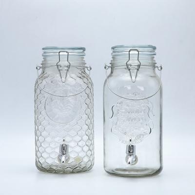 China Viable Clear Embossed Glass 4 Liter Juice Dispenser With Tap Metal Clip Glass Lid for sale